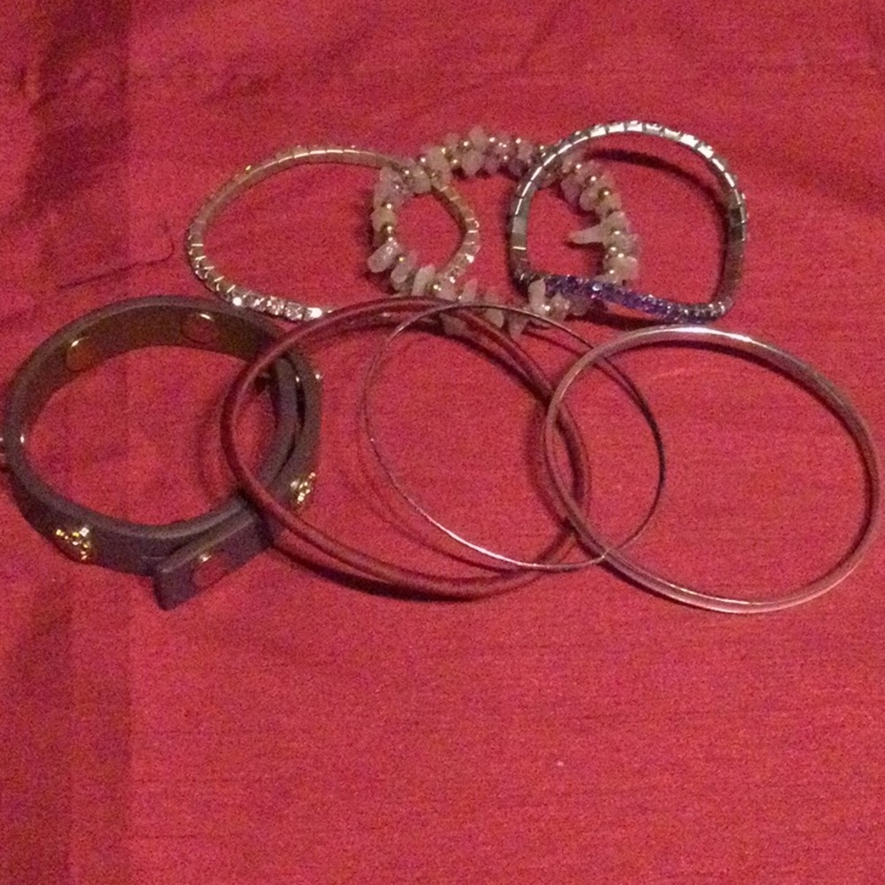 7 Pink/Purple Bracelets